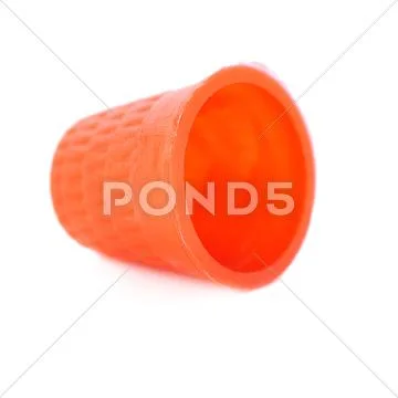 Plastic thimble isolated over the white background Stock Photos