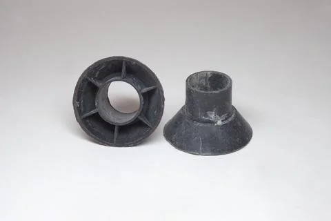 Plastic tie rod cones pair. one showing bottom wider side, base Stock Photos