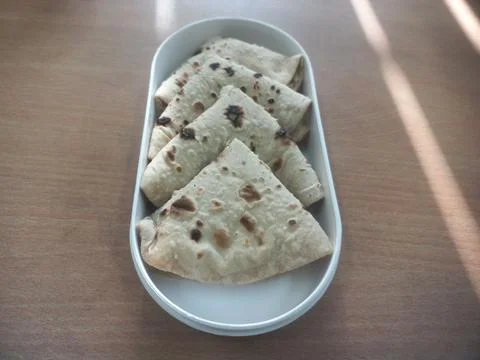 A plastic tiffin decorated with bread for dinner Stock Photos