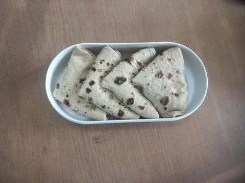 A plastic tiffin decorated with bread for dinner Stock Photos