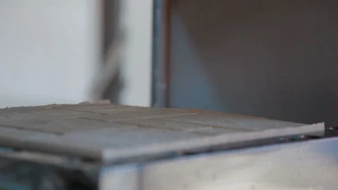 Plastic tile from stamping press in plastic recycling factory Stock Footage 88360619