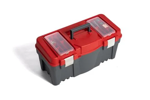 Plastic tool box on a white background. Set of working tools. DIY theme Fotos Stock