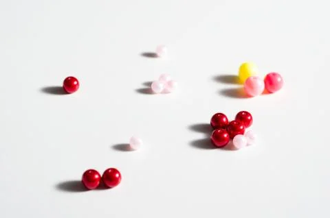 Plastic  toy balls  representing the concept of social distancing  or  closen Stock Photos