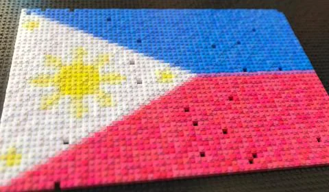 Plastic toy blocks compose flag of the Philippines, conceptual 3d rendering Ilustración de archivo
