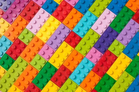 Plastic toy building blocks background Foto stock