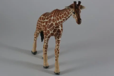 Plastic toy giraffe Stock Photos