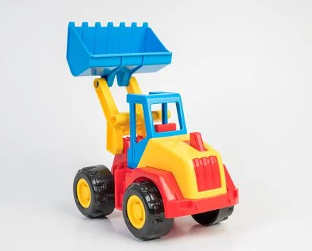 Plastic toy models of construction vehicles. Bulldozer. Fotos de archivo