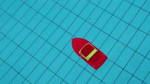 Plastic toy ship in the pool. Stock Footage 147569499