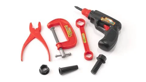 Plastic toy tools isolated on a white background. Stock Photos