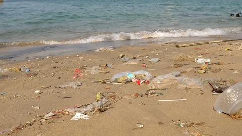 Plastic Trash on Beach Stock Footage 127933166