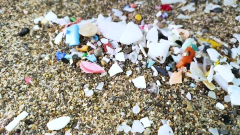 Plastic trash on the beach in Japan, rotating Stock Footage 305359416
