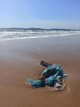Plastic trash on the beach Stock Photos