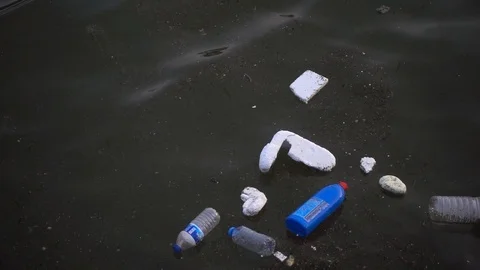Plastic Trash Garbage Floating on Sea Water 4 Stock Footage 103823558