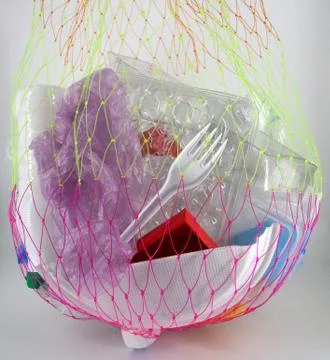 Plastic trash on the net Stock Photos