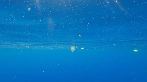 Plastic trash pollution in the ocean Video stock 89694046