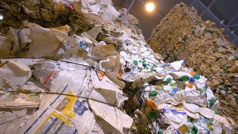 Plastic trash pressed and tied up compactly. Video stock 76355079