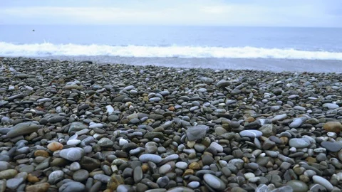 Plastic trash on the stone seashore. environmental problems Stock Footage 122176673