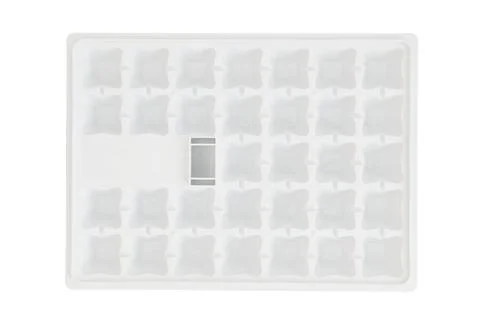Plastic tray for producing ice cubes in the freezer of the refrigerator Stock Photos