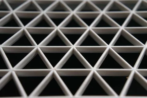 Plastic triangular mesh Stockfoto's