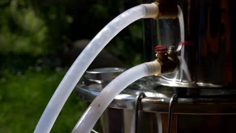 Plastic tube through which water passes for distillation. Slow motion 4K Video stock 320109710