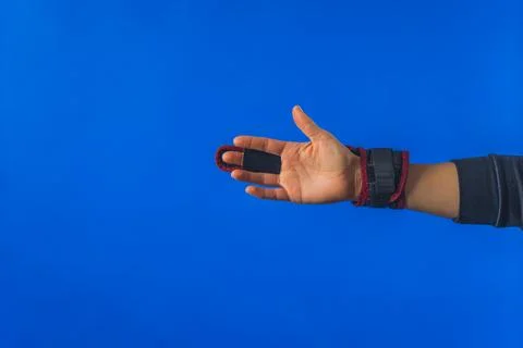Plastic two sided finger splint with two convenient hook and loop straps on an Stock Photos