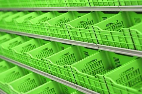 Plastic vegetable and fruit crates in a row on supermarket shelves. 스톡 사진