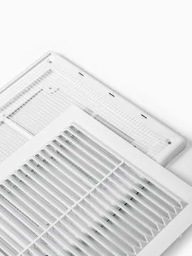 Plastic ventilation grate is isolated on a white background. Close-up. Stock Photos