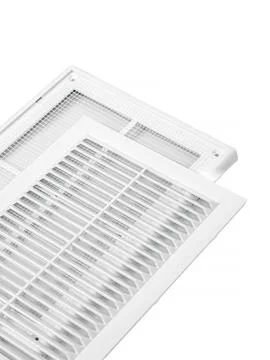 Plastic ventilation grate is isolated on a white background. Close-up. Stock Photos