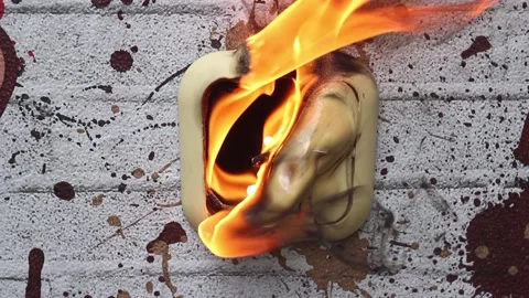 The plastic wall light switch on the wall lights up and melts. There was a short Stock Footage 153795760