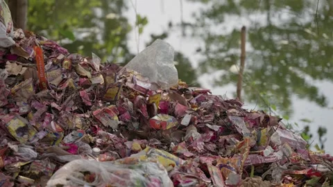 Plastic Waste And Garbage Piled Up Near River Bank In India Stock Footage 332890105
