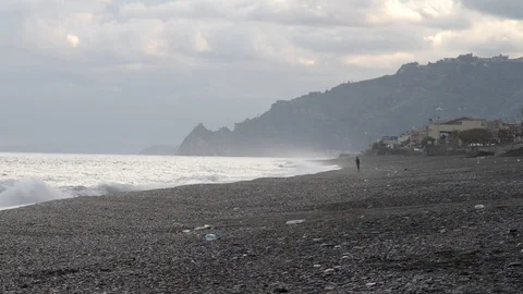 Plastic waste on the beach after a storm Stock Footage 97781864