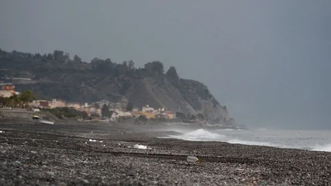 Plastic waste on the beach after a storm Stock Footage 97782283
