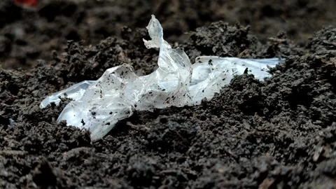 Plastic waste buried in the soil 스톡 동영상 322149385