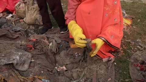 Plastic waste collection and segregation by hand Stock Footage 301503492