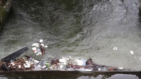 Plastic waste dumped into rivers as an environmental issue Stock Footage 294736053