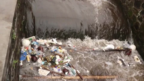 Plastic waste dumped into rivers as an environmental issue Stock Footage 295010975