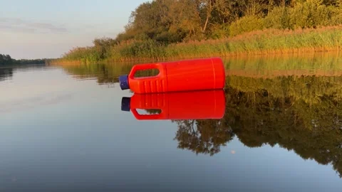 Plastic waste in lake. Ocean pollution, marine debris. Marine litter. Stock Footage 251767537