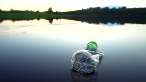 Plastic waste in lake. Ocean pollution, marine debris. Stock Footage 282308338