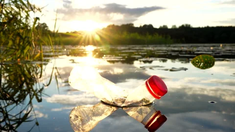 Plastic waste in lake. Ocean pollution, marine debris. Marine litter. Stock Footage 285946196
