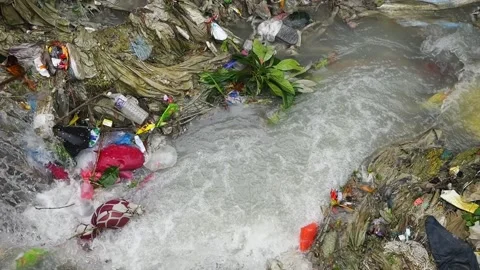 Plastic waste in Nepal rivers. single use plastic, microplastics in the Everest Stock Footage 252891587