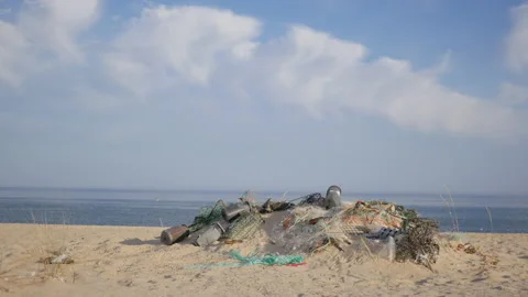 Plastic Waste in the Ocean and Beach, Environment Pollution, 4k Stock Footage 201128929