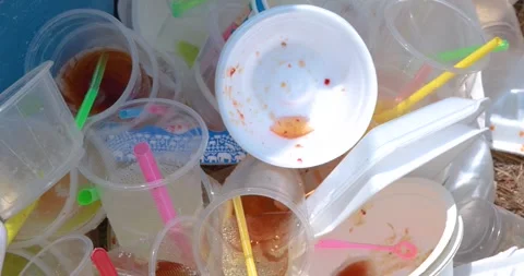 Plastic waste pile including cups and foam containers, Garbage pile Stock Footage 334576284