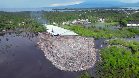 Plastic waste polluting environment dump with cows. Brilliant aerial viewdrone 스톡 동영상 332617148