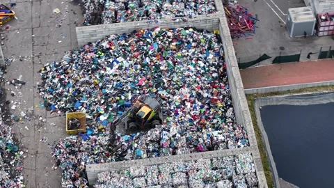 Plastic waste processing at recycling facility shows operations and logistics Stock Footage 337983591