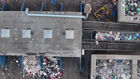 Plastic waste processing at recycling facility for sustainable management Stock Footage 337984152