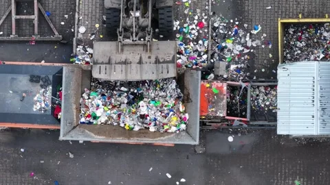 Plastic waste processing at recycling facility for sustainable solutions Video stock 337984465