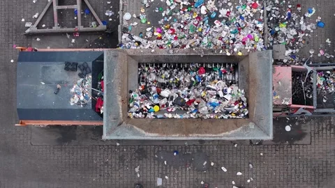 Plastic waste processing at a recycling facility for sustainable management Stock Footage 337984533