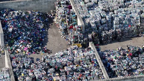 Plastic waste processing at a recycling facility for environmental protection Stock Footage 337984695