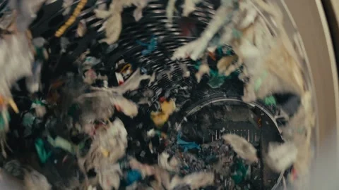 Plastic Waste Spinning Inside a Large Industrial Recycling Machine Drum Vidéo 331166460