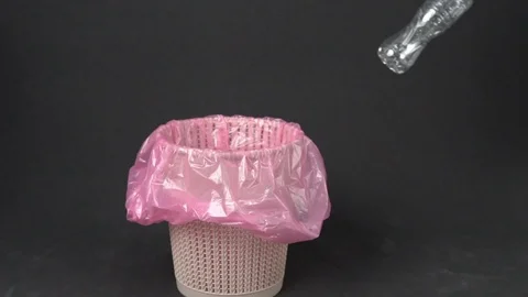 Plastic waste in a trash bin Stock Footage 112397817